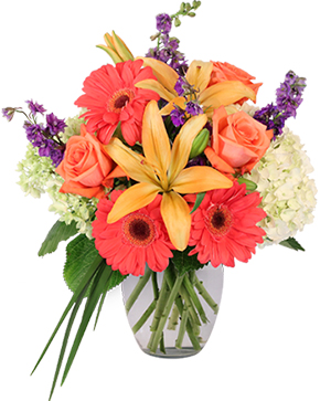 Aurora bouquet with orange lilies, roses, and yellow tulips